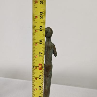 Tall Metal Figurine Playing Instrument