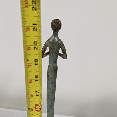 Tall Metal Figurine Playing Instrument