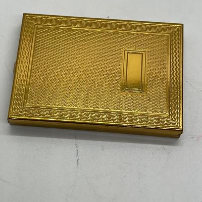 Gold tone pocket sized photo album