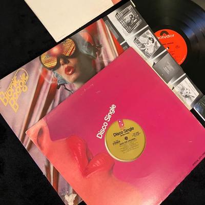 Vintage Rock and Roll Record Album Collection with Top Gun
