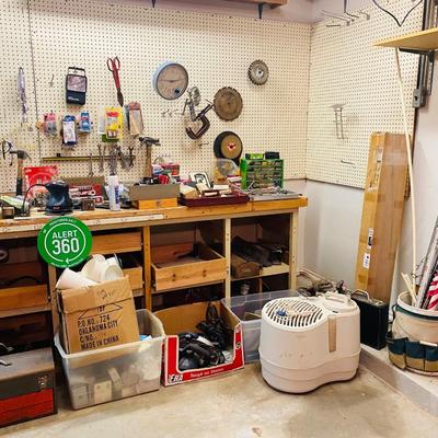 Lot 17: Wall of tools, wood & More