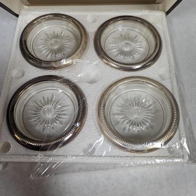 2 Sets Of Leonard Coasters