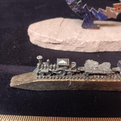 SMALL PEWTER TRAIN MOUNTED ON A RAILROAD TIE AND A SW DECORATIVE PIECE