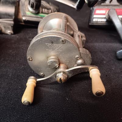 5 FISHING REELS IN NEED OF TLC