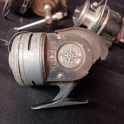 5 FISHING REELS IN NEED OF TLC