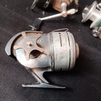 5 FISHING REELS IN NEED OF TLC