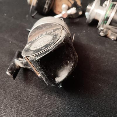 5 FISHING REELS IN NEED OF TLC