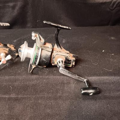 5 FISHING REELS IN NEED OF TLC