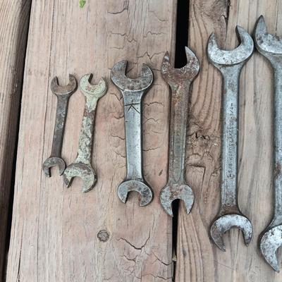 METAL TOOL BOX WITH VINTAGE AND ANTIQUE COMBINATION WRENCHES