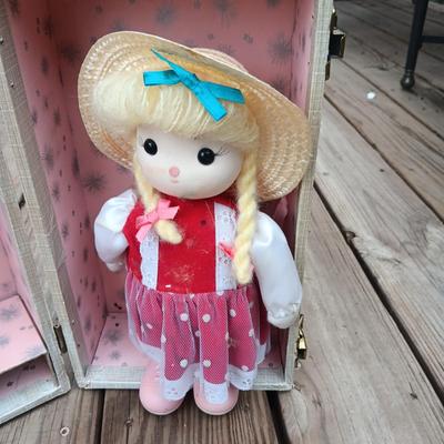 WIND UP MUSICAL DOLL, CARRY CASE, WOODEN DOLL CRADLE AND DOG FLASHLIGHT
