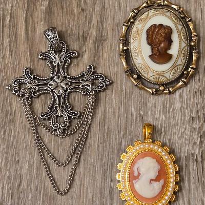 (2) Cameo Pendant Brooches and Cross Pendant