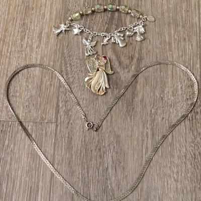 Miriam Haskell Angel Bracelet, an Angel Brooch, and Silver Tone Necklace