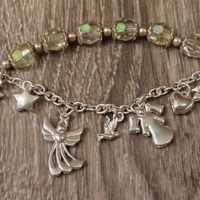 Miriam Haskell Angel Bracelet, an Angel Brooch, and Silver Tone Necklace