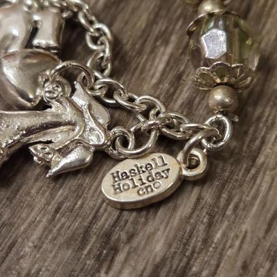 Miriam Haskell Angel Bracelet, an Angel Brooch, and Silver Tone Necklace