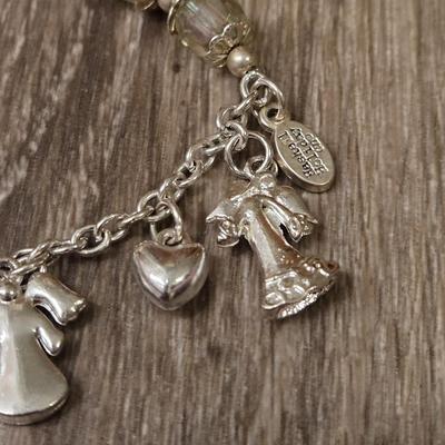 Miriam Haskell Angel Bracelet, an Angel Brooch, and Silver Tone Necklace