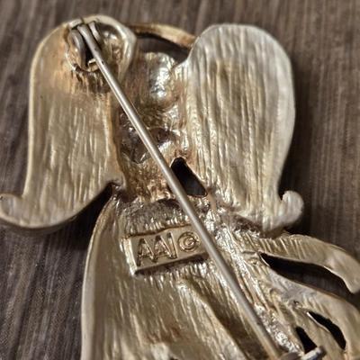 Miriam Haskell Angel Bracelet, an Angel Brooch, and Silver Tone Necklace