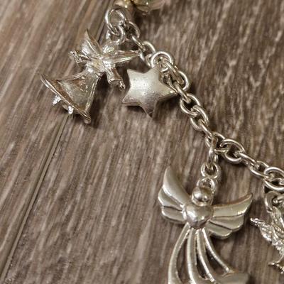 Miriam Haskell Angel Bracelet, an Angel Brooch, and Silver Tone Necklace