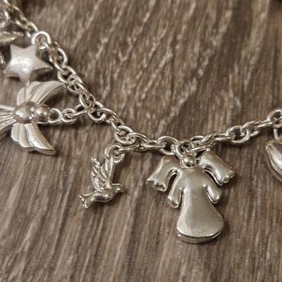 Miriam Haskell Angel Bracelet, an Angel Brooch, and Silver Tone Necklace