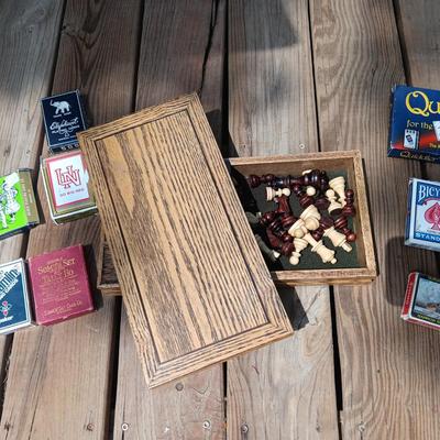 WOODEN CHESS BOARD AND SEVERAL DECKS OF CARDS