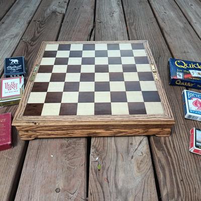 WOODEN CHESS BOARD AND SEVERAL DECKS OF CARDS
