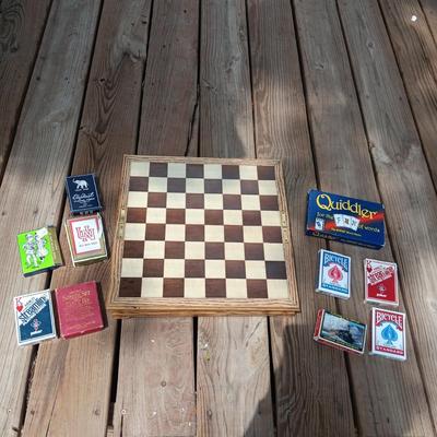 WOODEN CHESS BOARD AND SEVERAL DECKS OF CARDS