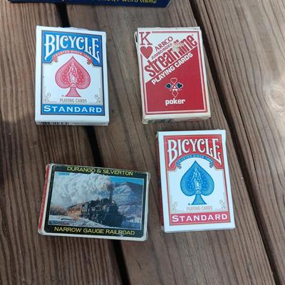 WOODEN CHESS BOARD AND SEVERAL DECKS OF CARDS