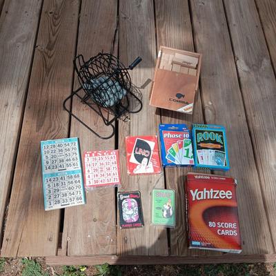 BINGO BALLS IN CAGE W/PLAYING CARD, JENGA AND SOME CARD GAMES