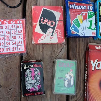BINGO BALLS IN CAGE W/PLAYING CARD, JENGA AND SOME CARD GAMES