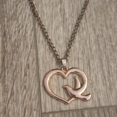 Cross. Heart and Triangle Pendant Necklaces