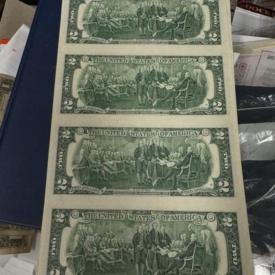 Uncut sheet of U S two dollar bills