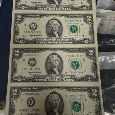 Uncut sheet of U S two dollar bills