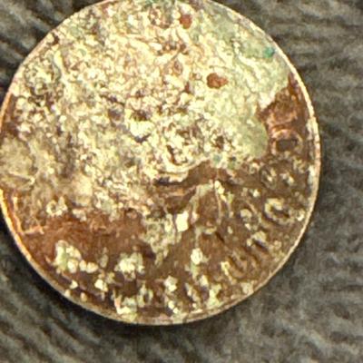 2015 Dime struck by Penny planchet