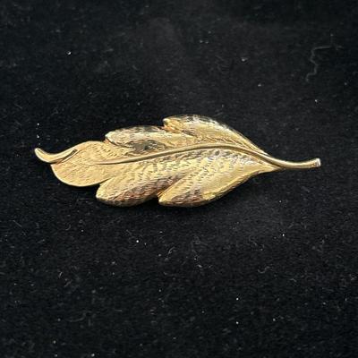 Gold tone leaf pin