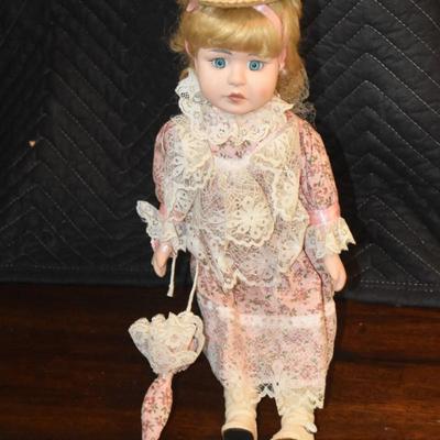 Doll with Umbrella