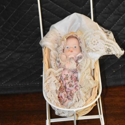 Doll In Buggy