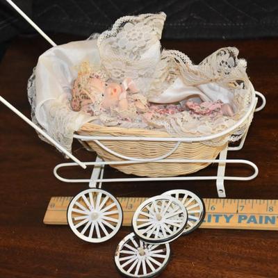Doll In Buggy