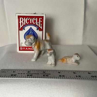 Set of 3 small ceramic dogs