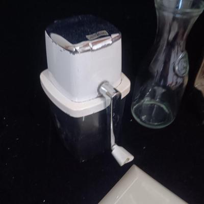 LIQUOR DECANTERS, ICE CRUSHER, MUSTACHE CUP, ZIPPO LIGHTER AND MORE