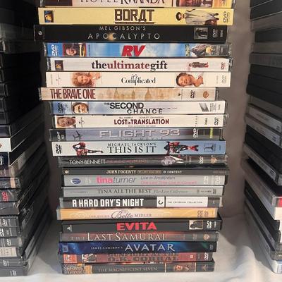 Over 100 Music and Movie DVD’s (B1-DZ)