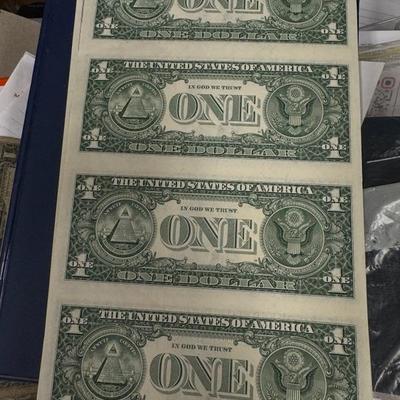 Uncut sheet of U S one Dollar bills
