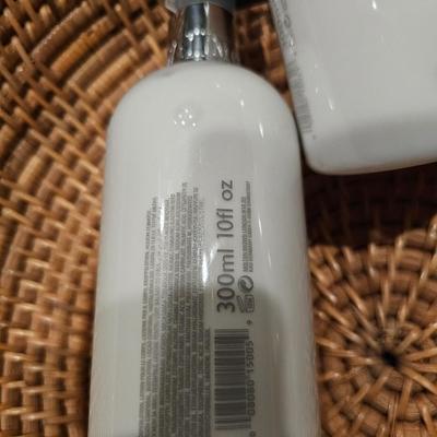 High End Designer Lotion, Perfume, Hat, and Weaved Basket