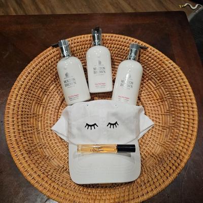 High End Designer Lotion, Perfume, Hat, and Weaved Basket