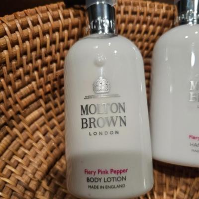 High End Designer Lotion, Perfume, Hat, and Weaved Basket
