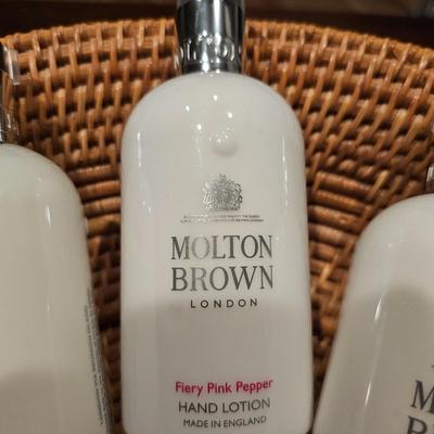High End Designer Lotion, Perfume, Hat, and Weaved Basket