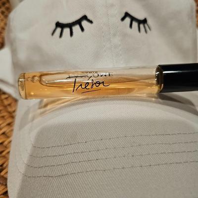 High End Designer Lotion, Perfume, Hat, and Weaved Basket