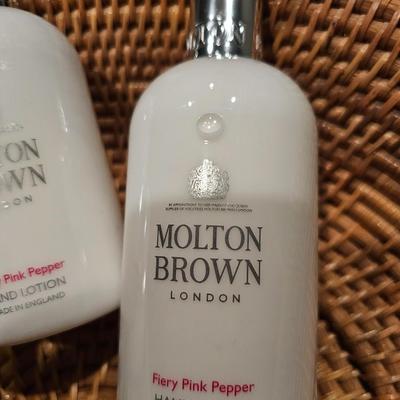 High End Designer Lotion, Perfume, Hat, and Weaved Basket
