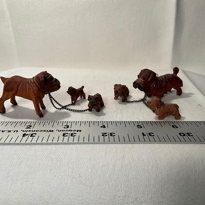 2 sets of Wooden folk art carved dogs