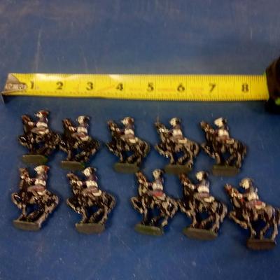 LOT 84 TEN OLD METAL TOY SOLDIERS ON HORSEBACK