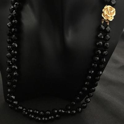 Vintage black glass bead, two strand rose gold, toned clasp necklace