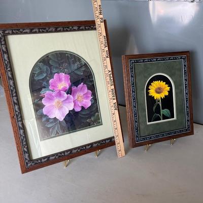 133 - two framed floral pictures with nice holders